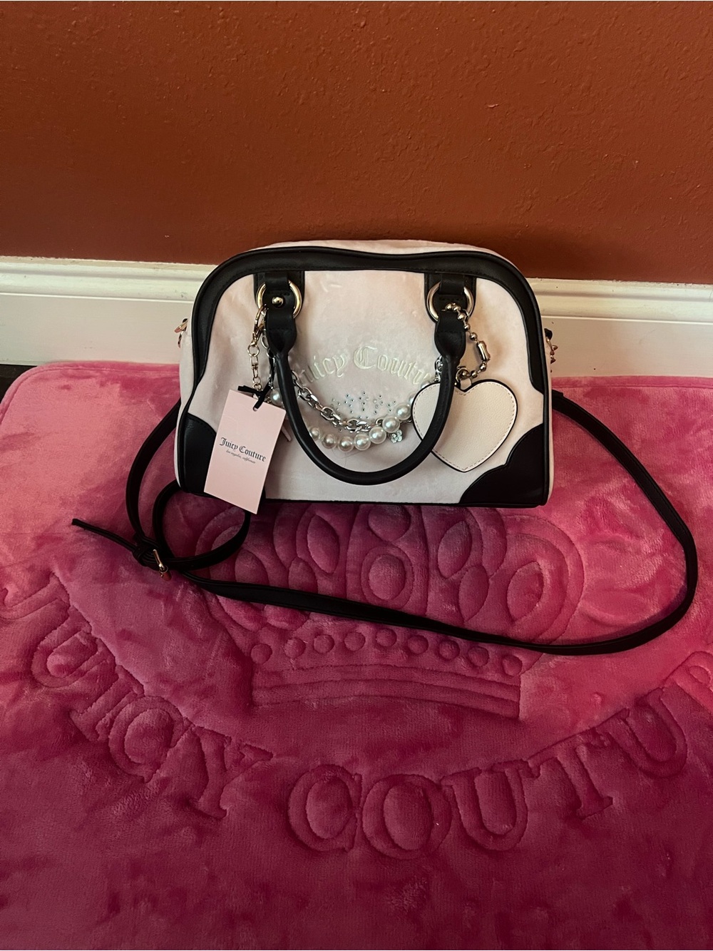 Juicy Couture Light Pink and Black Pearl-Accent Dome Satchel
